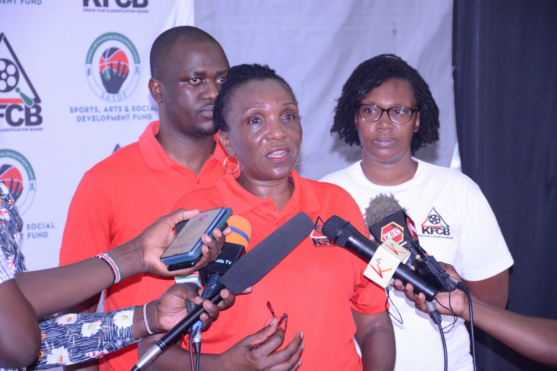  Ms Nelly Muluka,KFCB's Chief Manager for Corporate Services and Administration  flanked by Mr. Marcos Masiga, the Acting Manager for Licensing and Ms  Josephine Gitiri , KFCB's  Western Regional Head in a press briefing  during a press briefing during a stakeholder  engagement forum for creatives in Kisumu. 