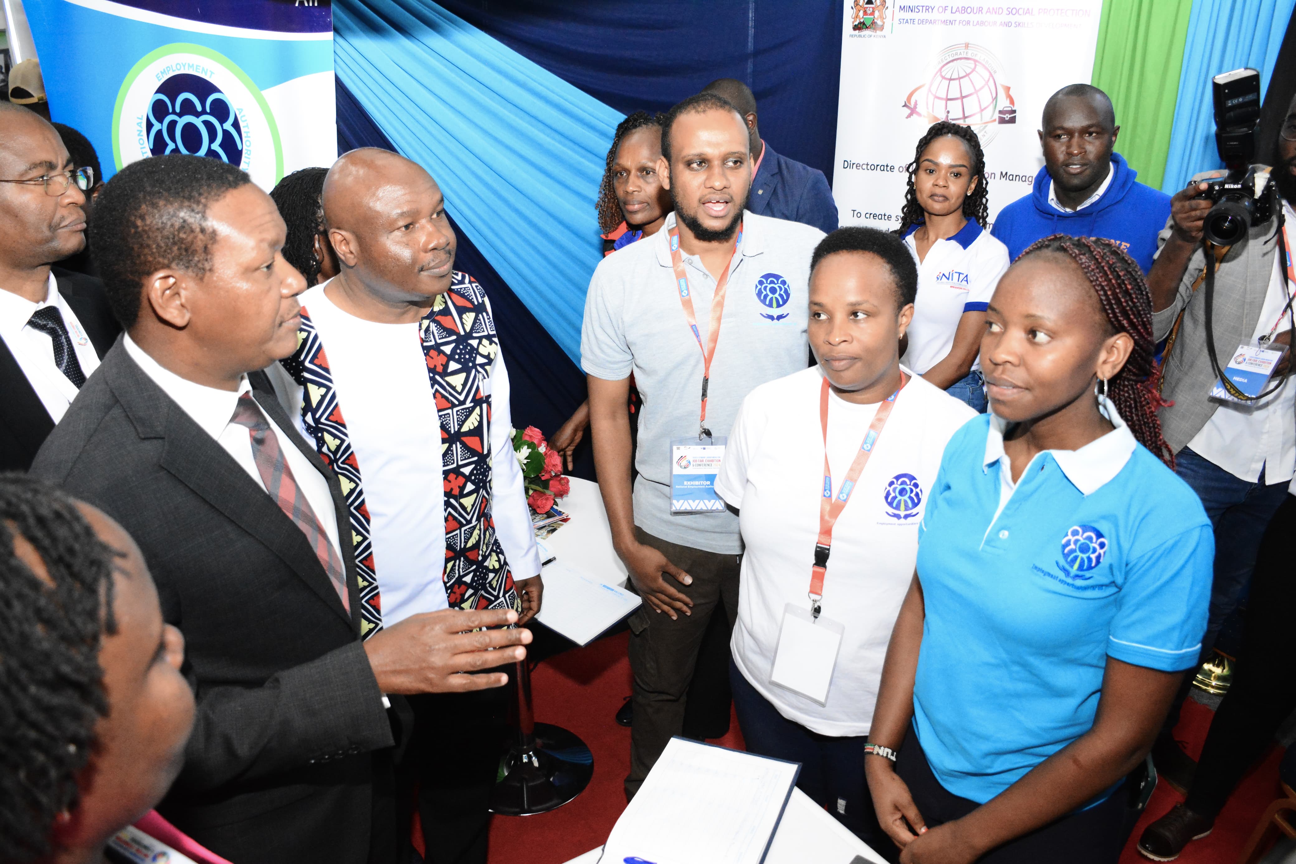 Labour and social Protection CS Dr.Alfred Mutua accompanied by his Labour and Skills Development PS Shadrack Mwadime visiting one of the exhibition booths during the Germany job exhibition  and conference at Sarit Center.