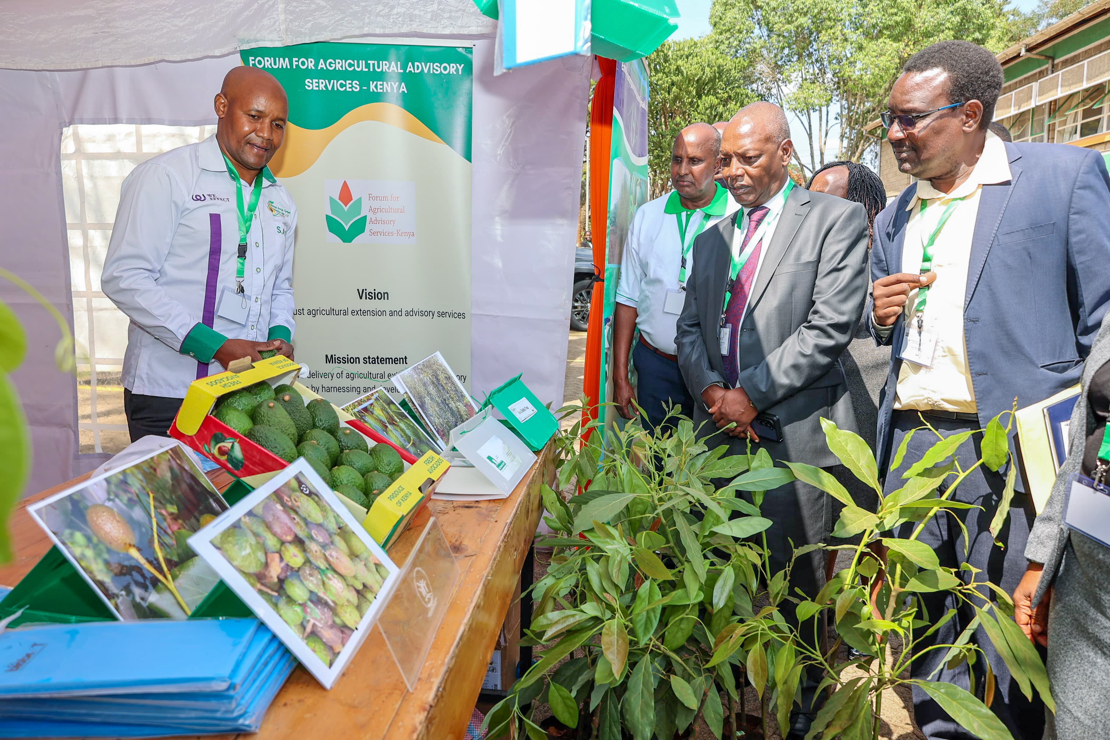 Ministry of Agriculture and Livestock Development Cabinet Secretary (CS) Dr Andrew Karanja (Second from Right) and KeFAAS CEO Peter Gitika (Right) visiting exhibition stands during the Forum for Agricultural Advisory Services - Kenya (KeFAAS) 2nd National Agricultural Extension Symposium. Photo/Joseph Ng’ang’a.