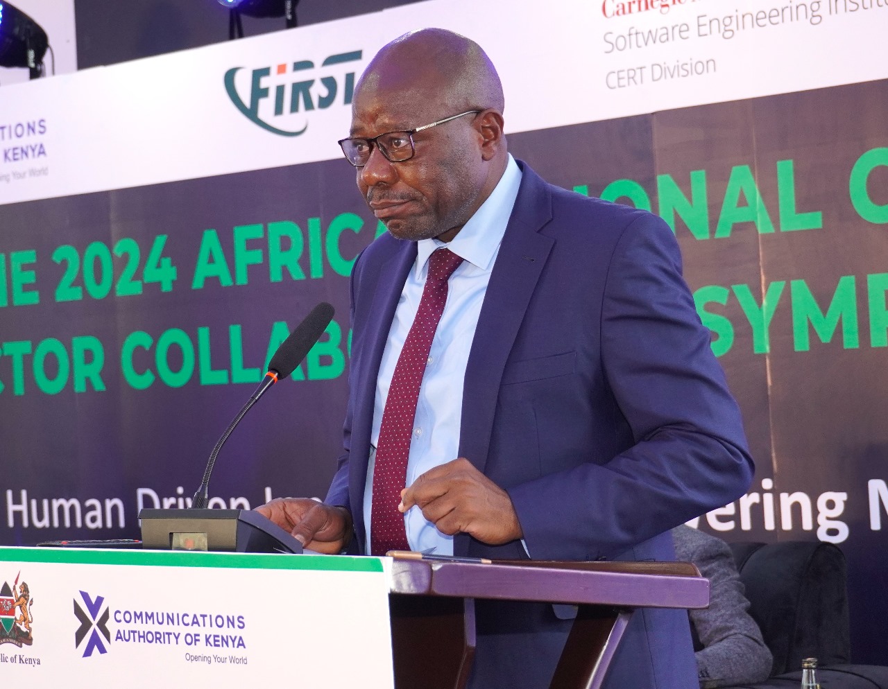 The Principal Secretary, Broadcasting and Telecommunications, Prof. Edward Kisiang’ani, speaking during the annual 2024 Africa Regional Cyber Sector Collaboration Symposium held in Nairobi. Photo/Austin Otieno.