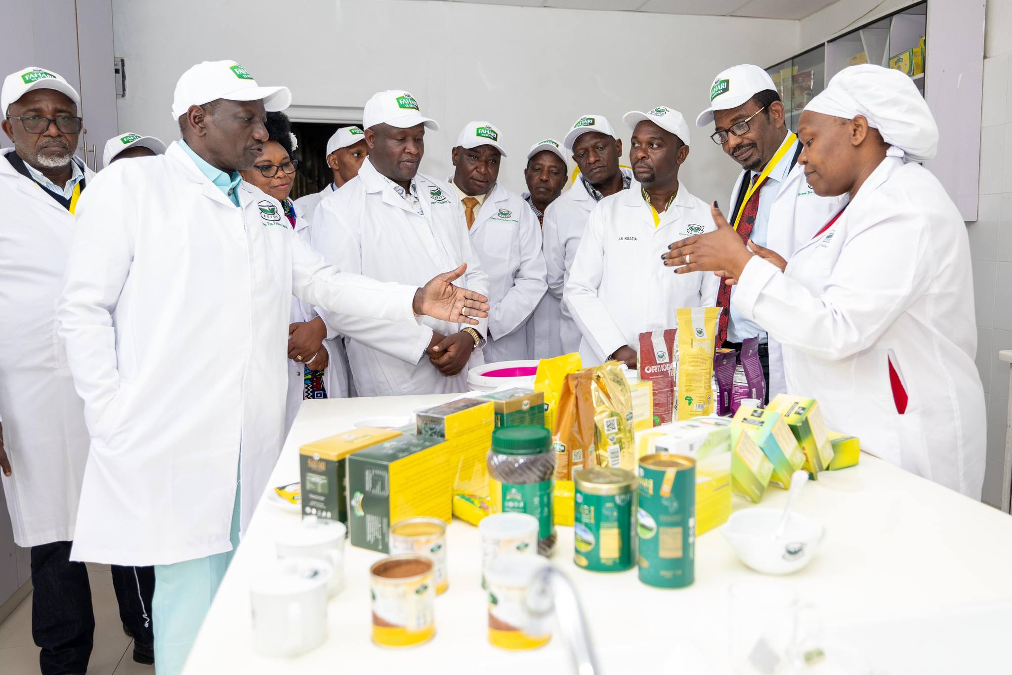 President William Ruto and other leaders on a tour through the KETEPA packaging Factory in Kericho County.