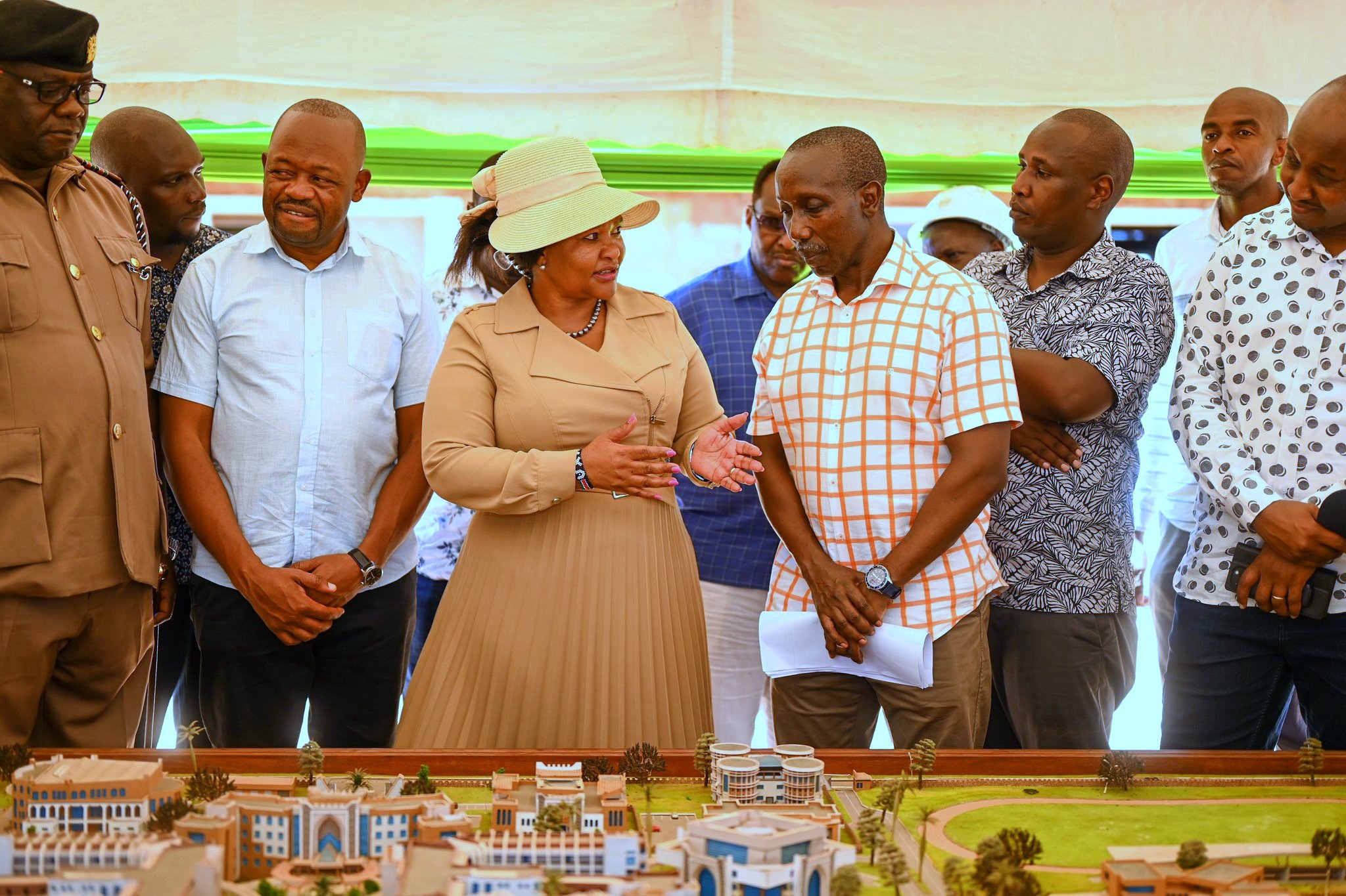 Cabinet Secretary (CS) for Tourism Rebecca Miano is taken through architecture designs during an inspection tour of the Ronald Ngala Utalii College, Vipingo. Photo/Andrew Hinga