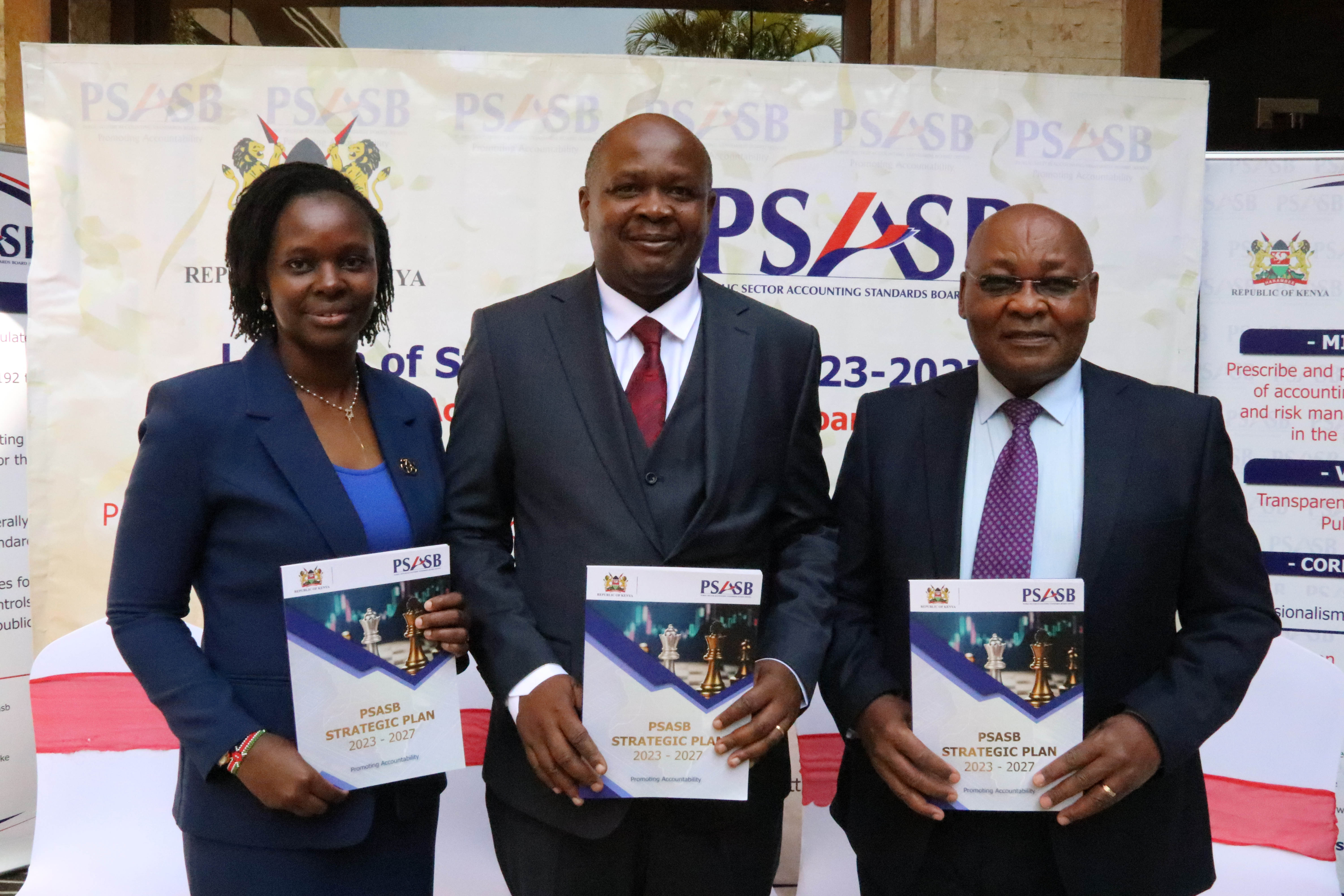 Mr Jonah Wala, the Director of Accounting Standards at the  National Treasury with the PSASB Board Chairman Pius Nduati and  the Acting CEO Ms Georgina Muchai dring the launch of the PSASB  2023-2027 Strategic Plan in Nairobi.