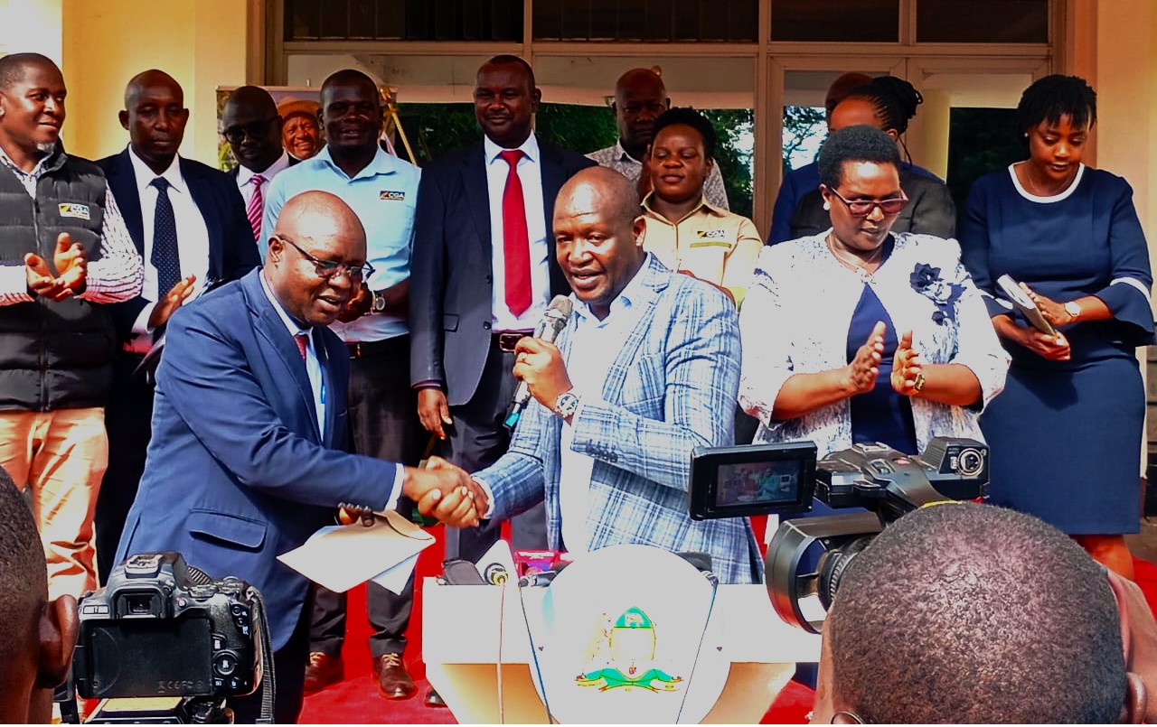 Kericho County Governor Dr. Erick Mutai Shake Hands with CGA Chairman Dr. Moses Mwenje shortly after the agreement signing