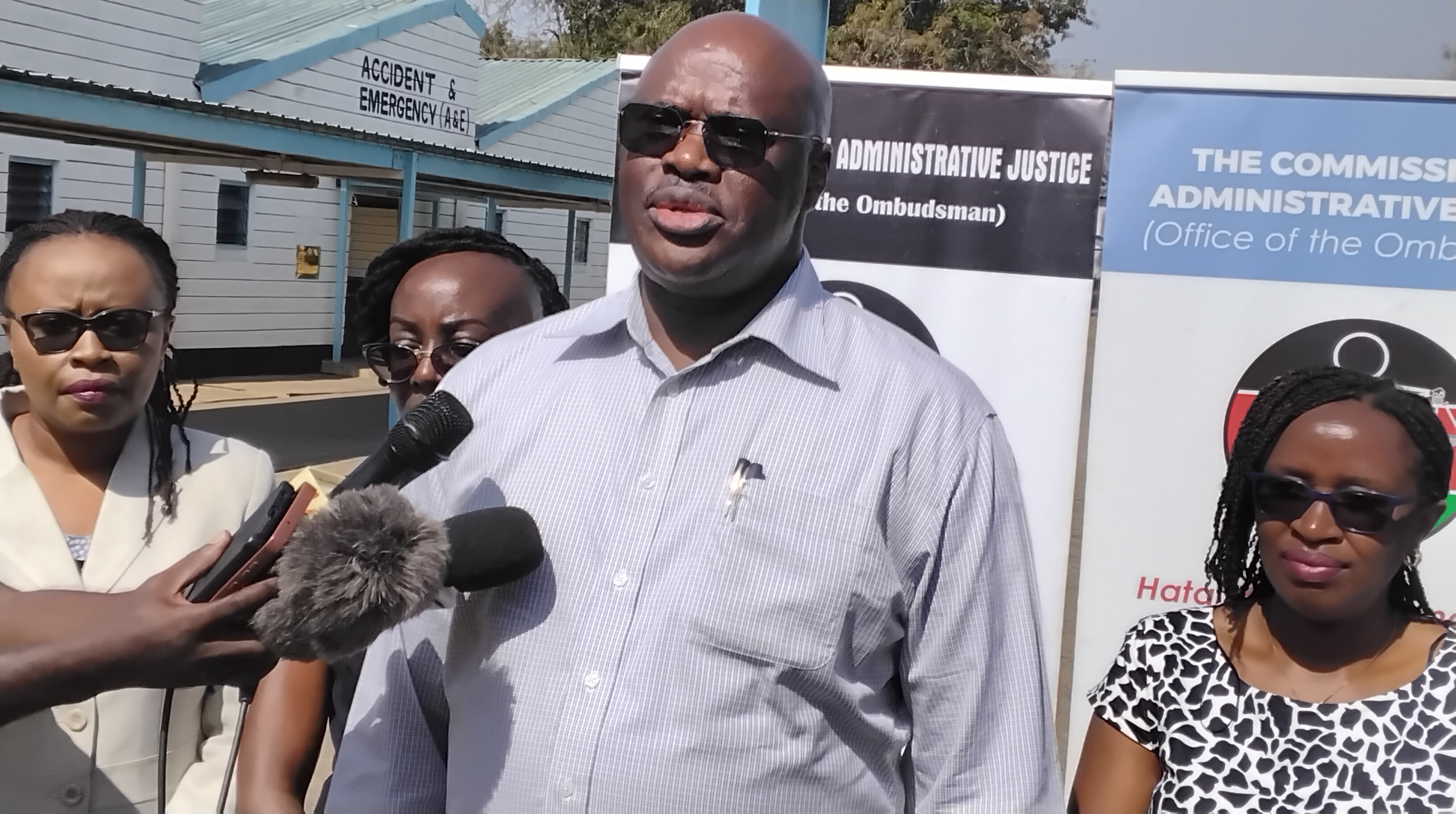 The Commission on Administrative Justice Chairman Charles Orinda addressing the media at Jaramogi Oginga Odinga Teaching and Referral Hospital (JOOTRH) in Kisumu during a spot check on the Social Health Authority (SHA) PHOTO: CHRIS MAHANDARA.