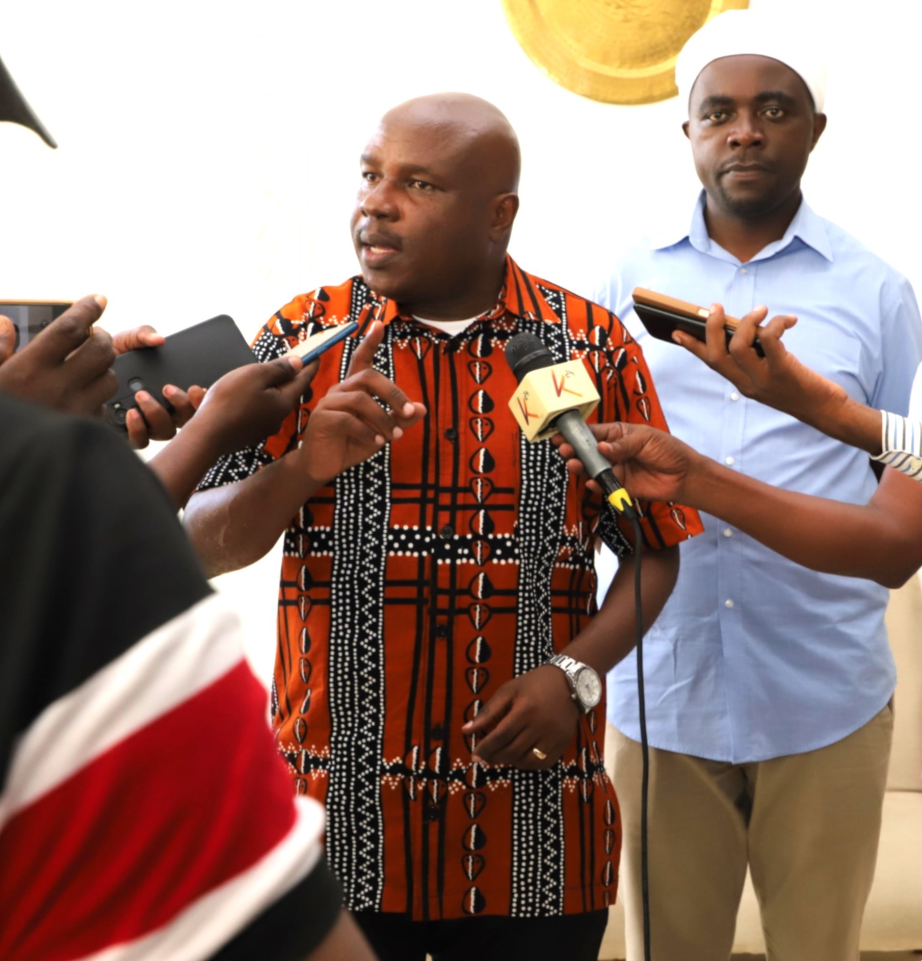  Labour and Skills Development Principal Secretary  Shadrack Mwadime (left) addresses the press.  He is flanked by Runyenjes MP  Eric Muchangi  Karemba.