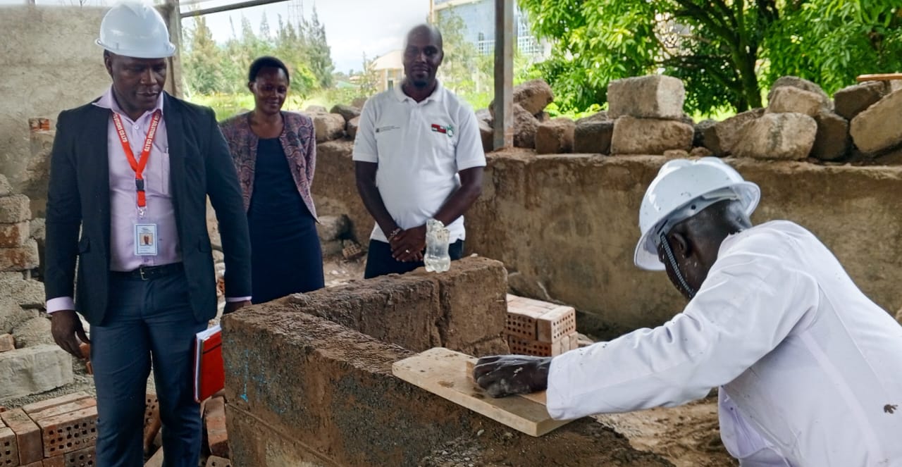 Officers from the RPL Directorate overseeing a masonry test for one of the candidates  seeking certification at Kisumu National Polytechnic.