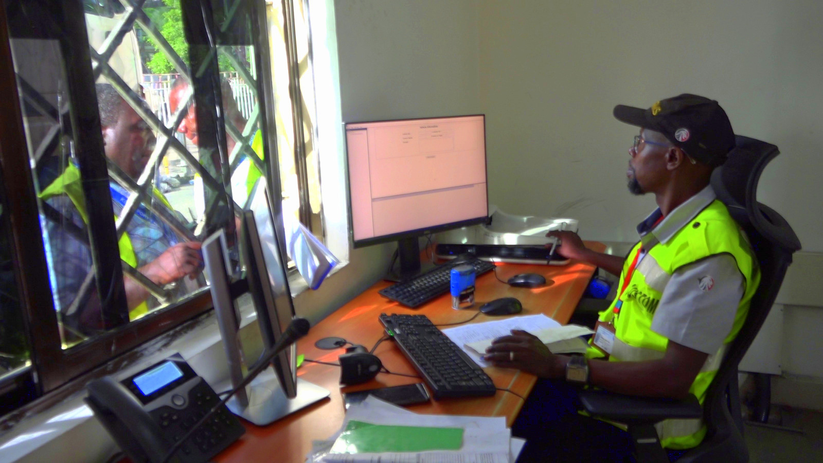 A Kenya Revenue Authority (KRA) Customs Officer clears cargo at a border point