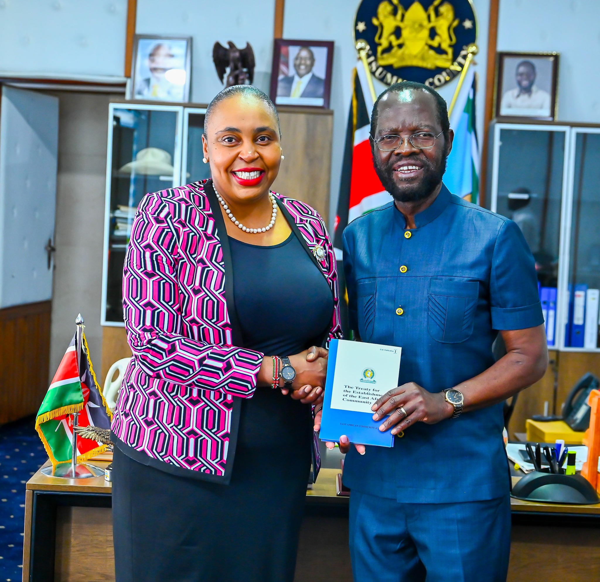 Principal Secretary (PS) for East African Community Affairs Dr. Carolyn Karugu and Prof Anyang Nyong'o, the Kisumu governor