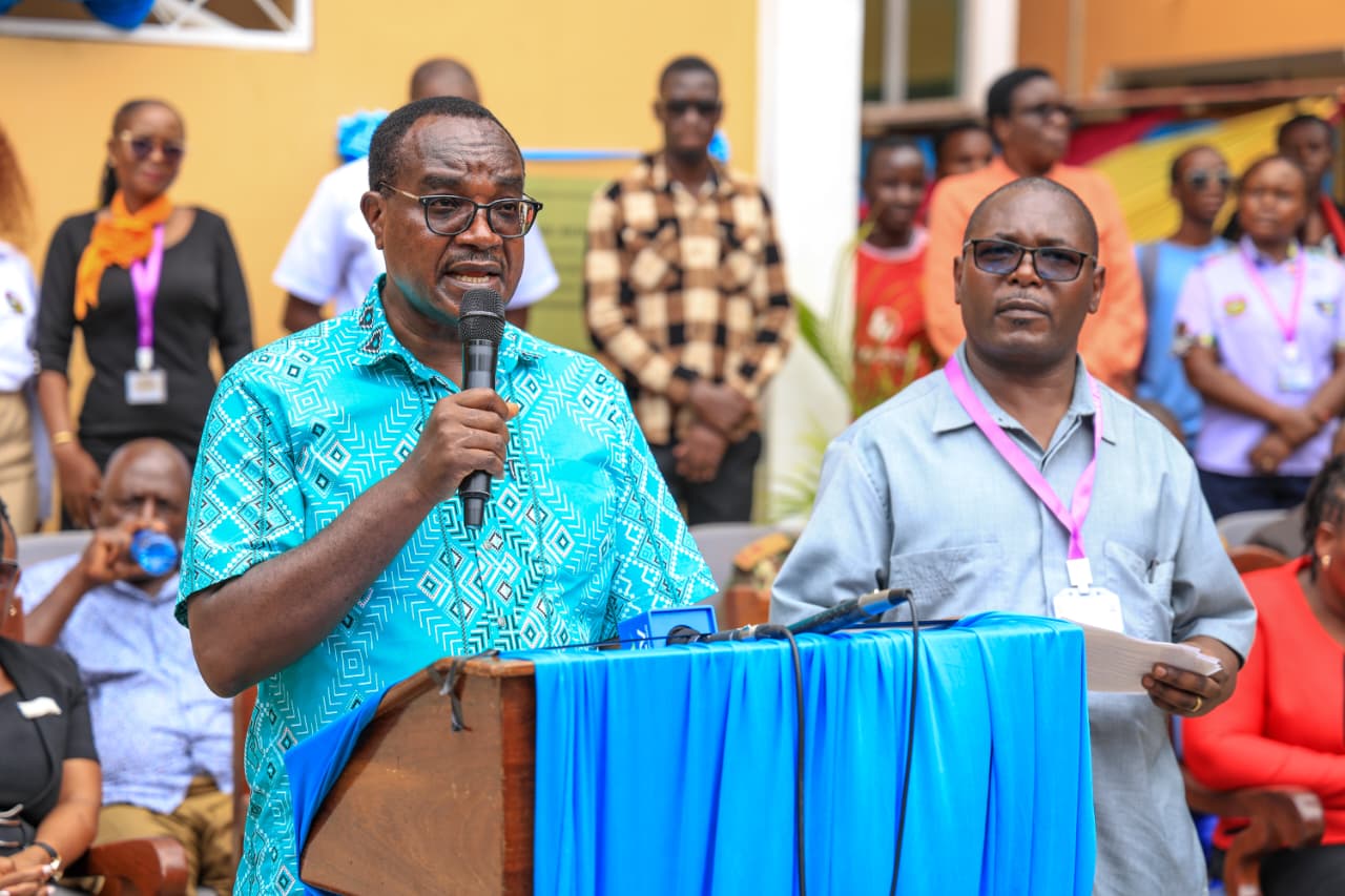 Education Cabinet Secretary, Julius Migos Ogamba speaking during the commissioning of a new Sh150-million five-storey academic block at the Kenya Coast National Polytechnic in Mombasa. Looking on is the institution’s Principal Andama Geoffrey Nyamweya (right). PHOTO: SITATI REAGAN