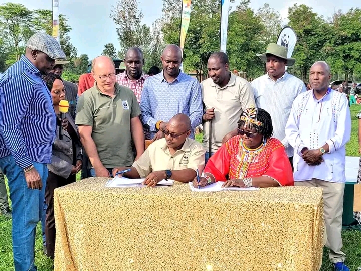 The Cabinet Secretary for East African Community, ASALs and Regional Development Beatrice Askul signs the Collaboration agreement between the World-Wide Fund for Nature Kenya (WWF-Kenya) and Regional Authorities