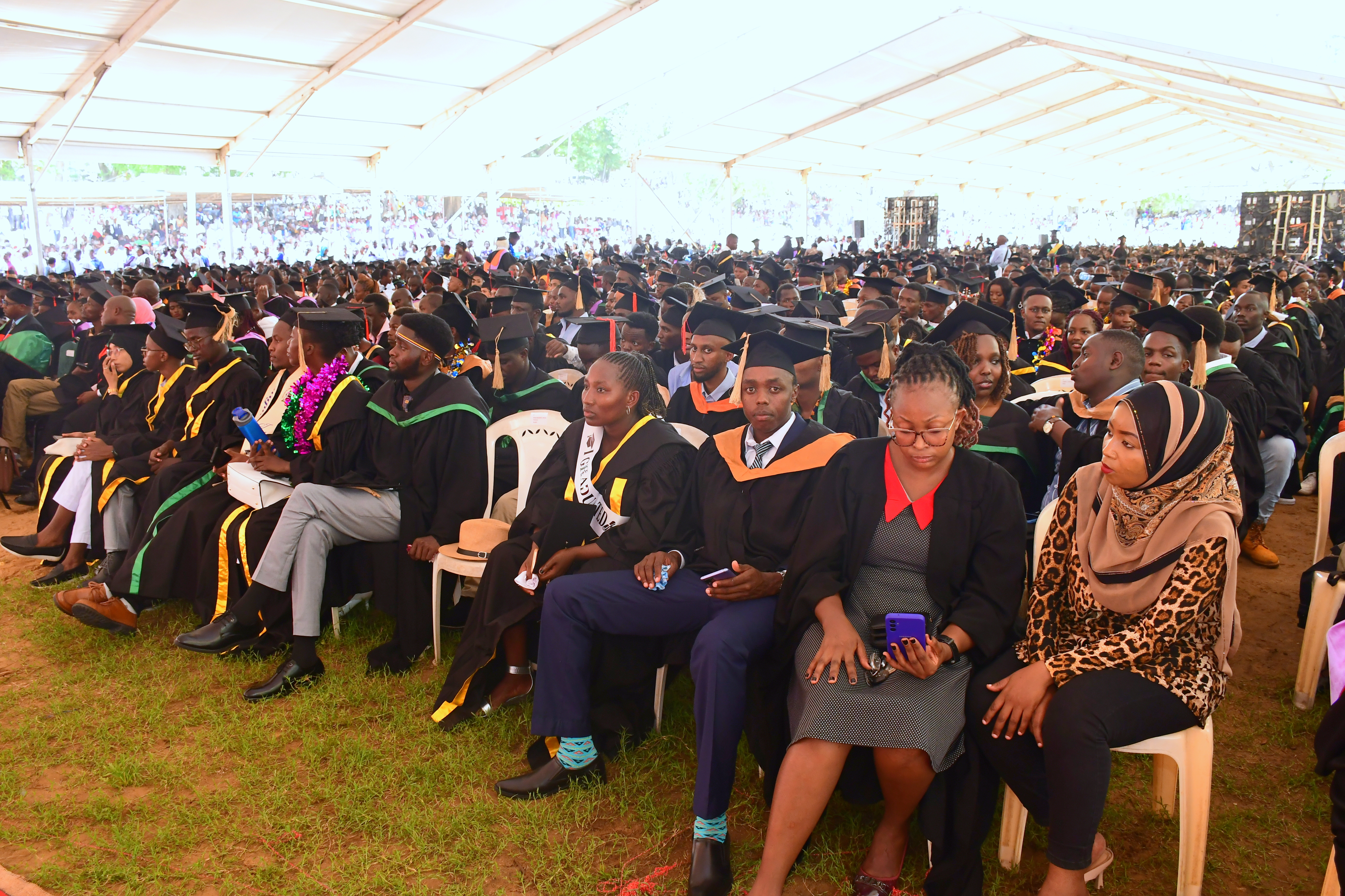 hamim Musa (C) flanked by her parents Musa Baker (L) and Somoe Baker after she graduated with a Diploma in Mass Communication at the Technical University of Mombasa. Photos/ Andrew Hinga