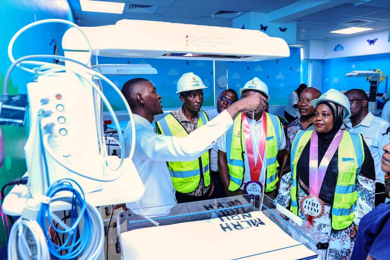 Kwale Governor Fatuma Achani cuts the ribbon during the commissioning of the newborn critical care units at the Msambweni referral hospital. 
