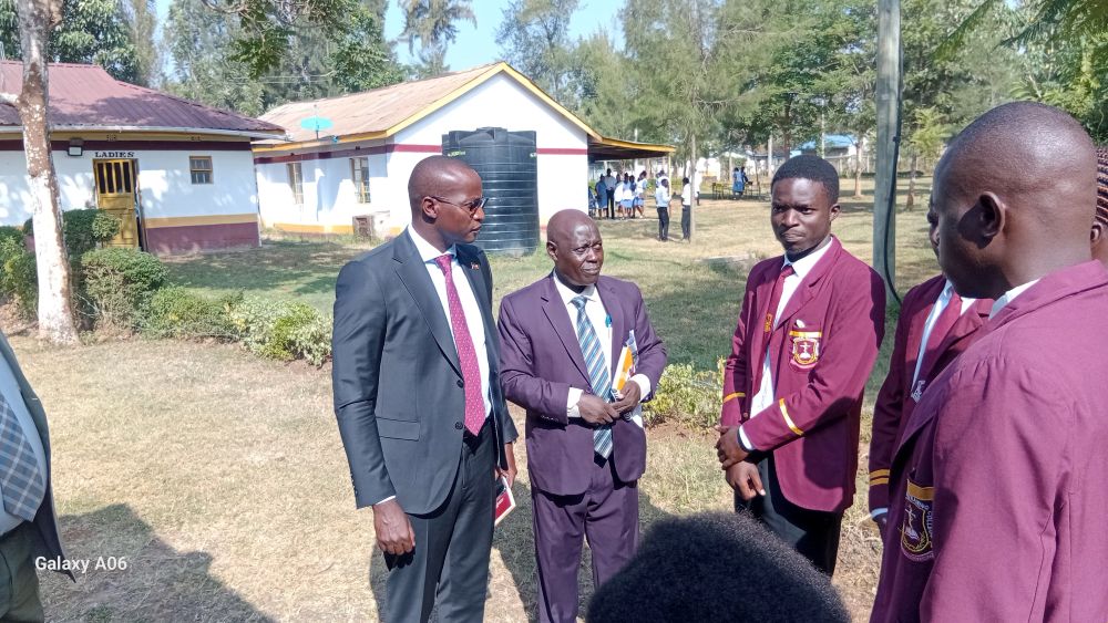 The Kenya Medical Training CEO Dr. Kelly Oluoch (red tie) during a routine visit to KMTC Bondo campus.