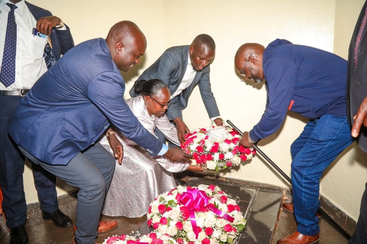 Nandi Deputy Governor Dr. Yulita Mitei (center) flanked by other leaders laying a wreath of flowers at the Koitalel Samoei Mausoleum in Nandi Hills.