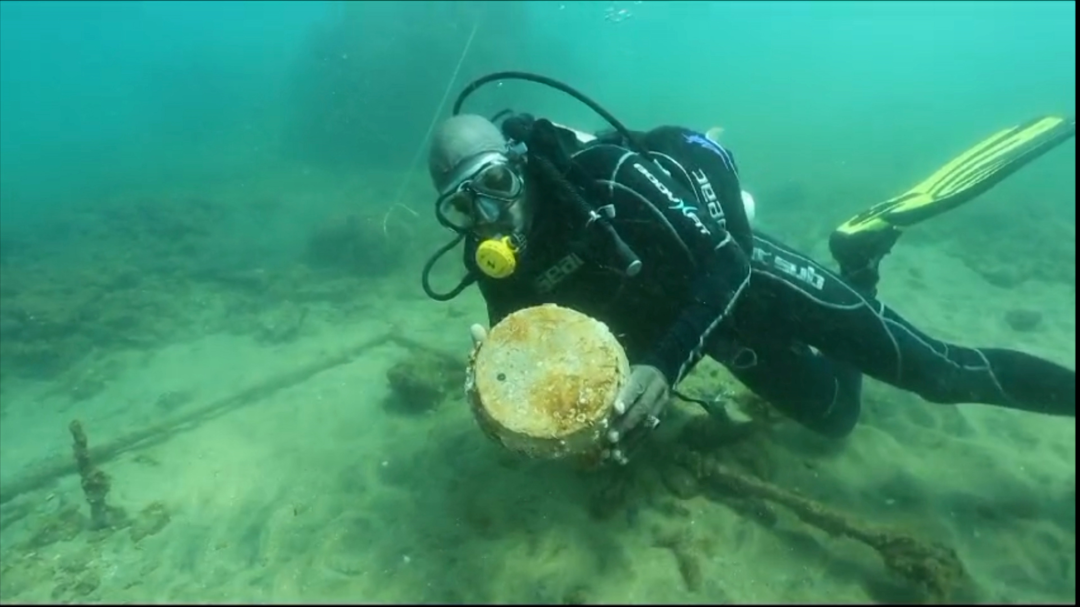 An archaeologist collecting items at the site of the ship wreckage believed to have sunk off the Ngomeni shores 500 years ago