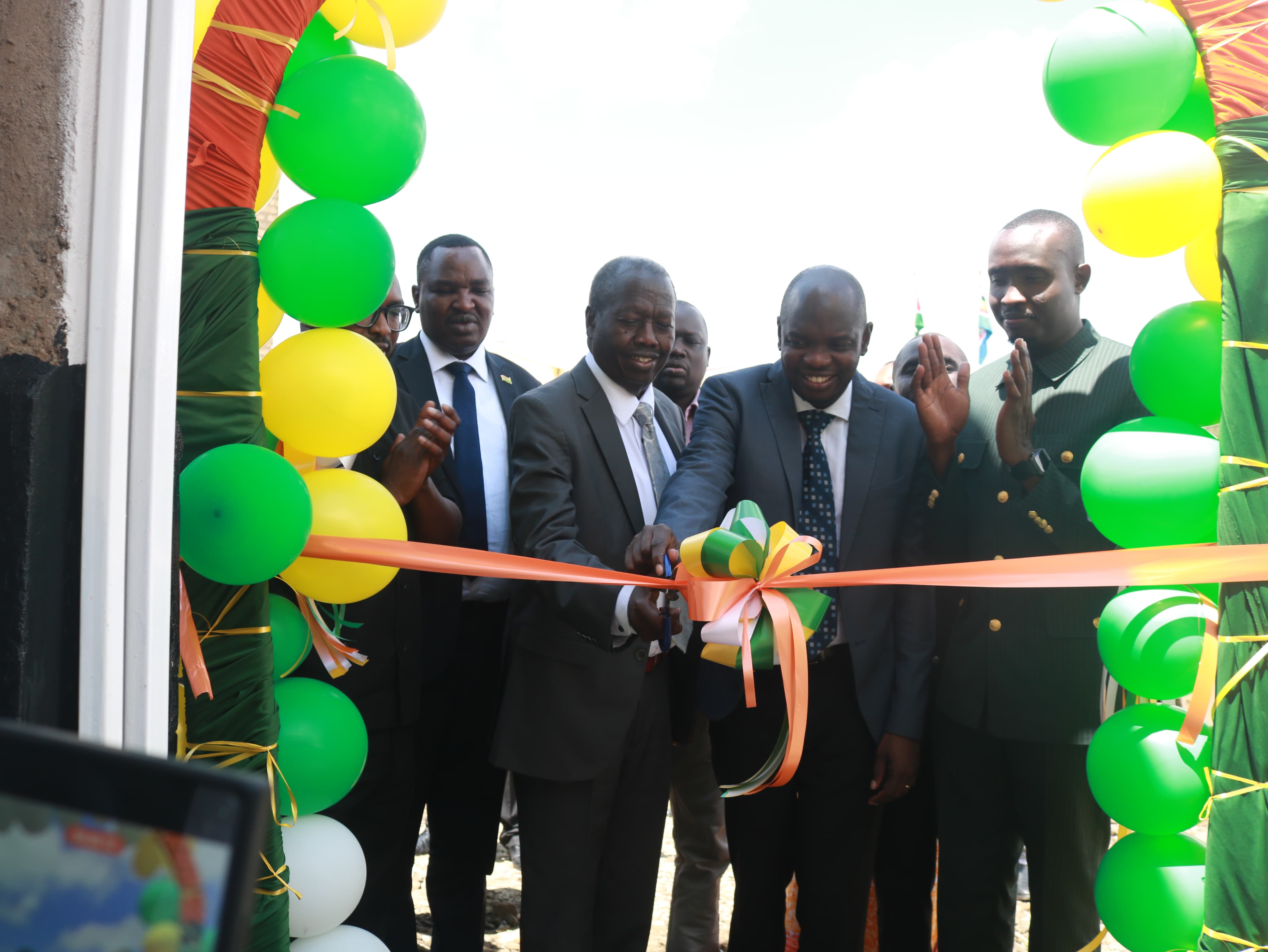 Baringo Governor Benjamin Cheboi and COMESA head of Governance Peace and Security Dr Oita Etyang launching the Kabarnet One Stop Youth Centre within the County headquarters. Photo/Benson Kelio