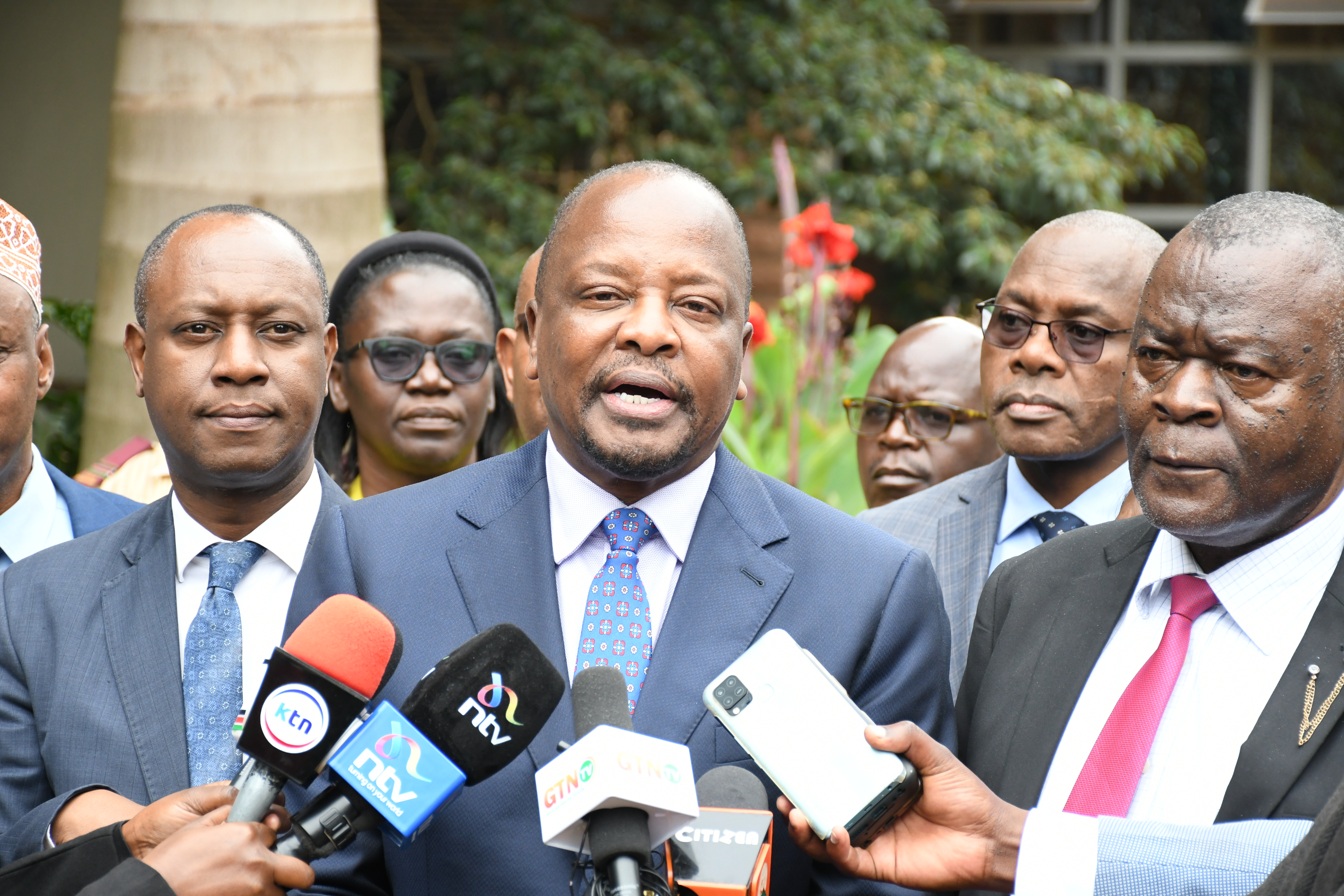 Agriculture and Livestock Development Cabinet Secretary Mutahi Kagwe(centre) during a press briefing on the sidelines of the launch of the 2023-2027 KEVEVAPI Strategic Plan at the FK resort in Nyeri