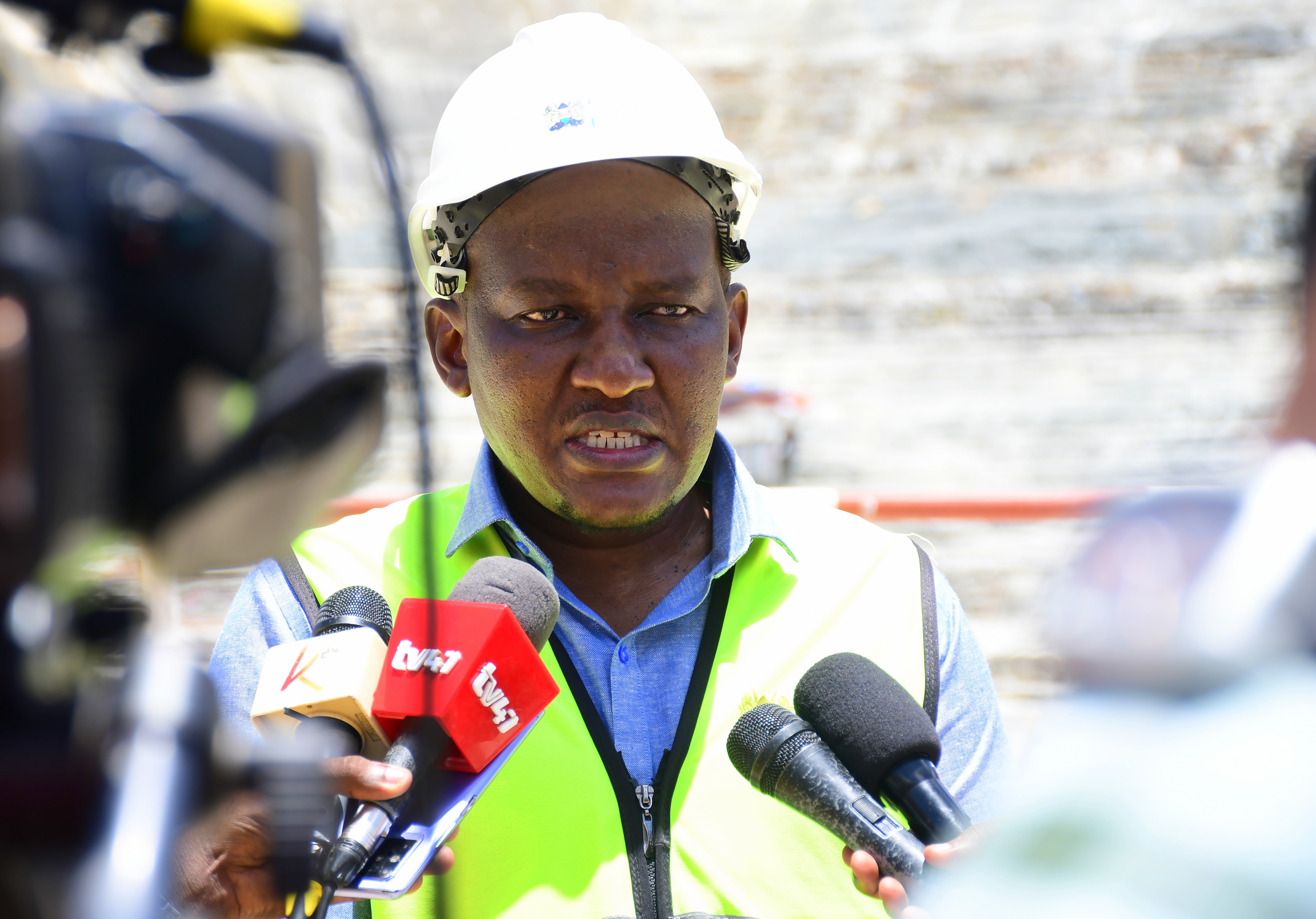Principal Secretary  (PS) State Department  of Irrigation Ephantus  Kimotho briefs the media  during a tour of the  Mwache Multipurpose  Dam under construction  in Kinango Sub-County,  Kwale. Photo/Andrew Hinga