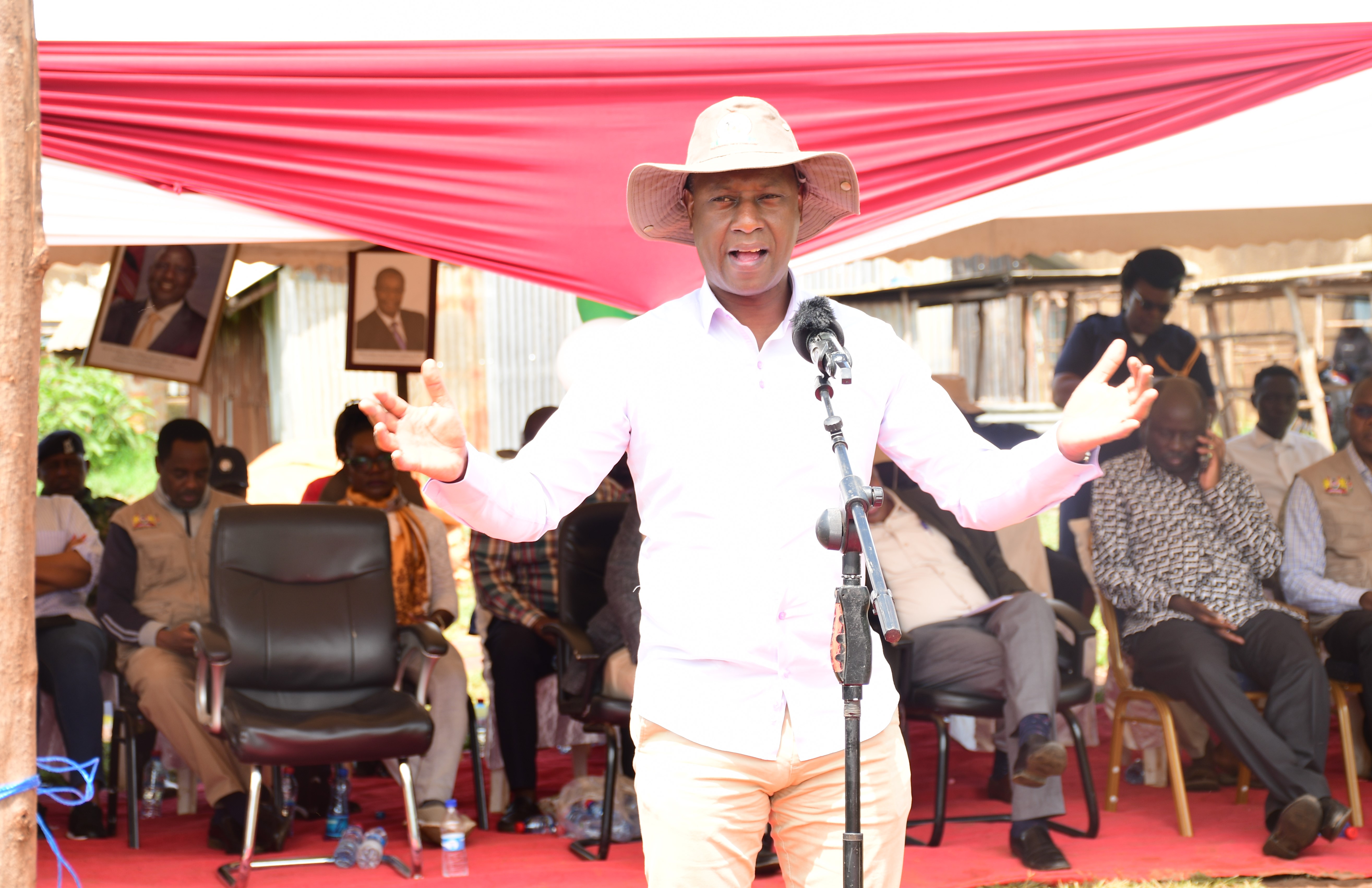 PS livestock production Jonathan Mueke cutting the ribbon as he officially opens Nambale livestock sale yard in Nambale Sub County, Busia County 