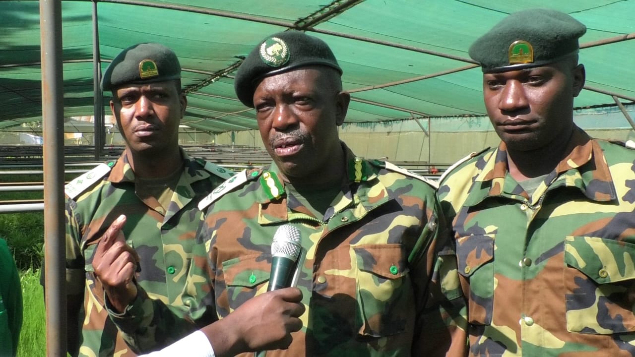 Meru County Forest Conservator Mr Wellington Ndaka addressing journalists inside a model tree nursery established at Meru forest station.