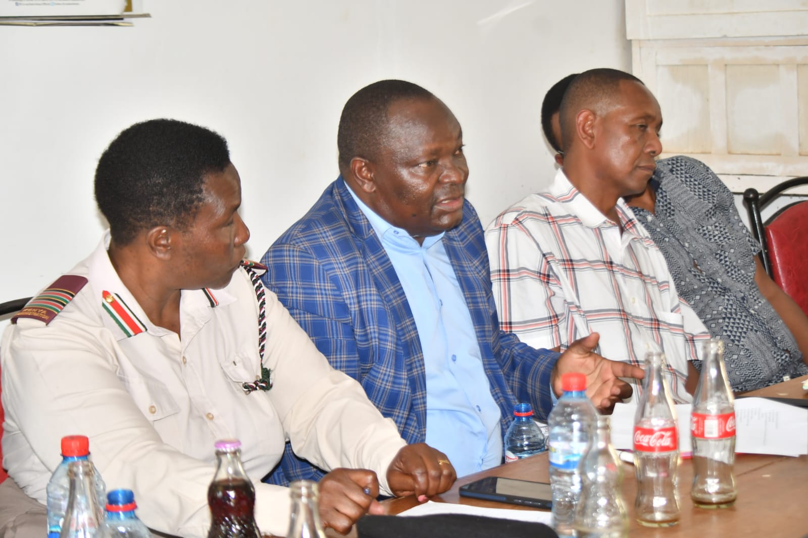 State Department for Cooperatives Secretary Administration Amos Mariba (in checked blue  court) during the Luanda Ginnery site handing over ceremony to the contractor. PHOTOS BY CHRIS MAHANDARA