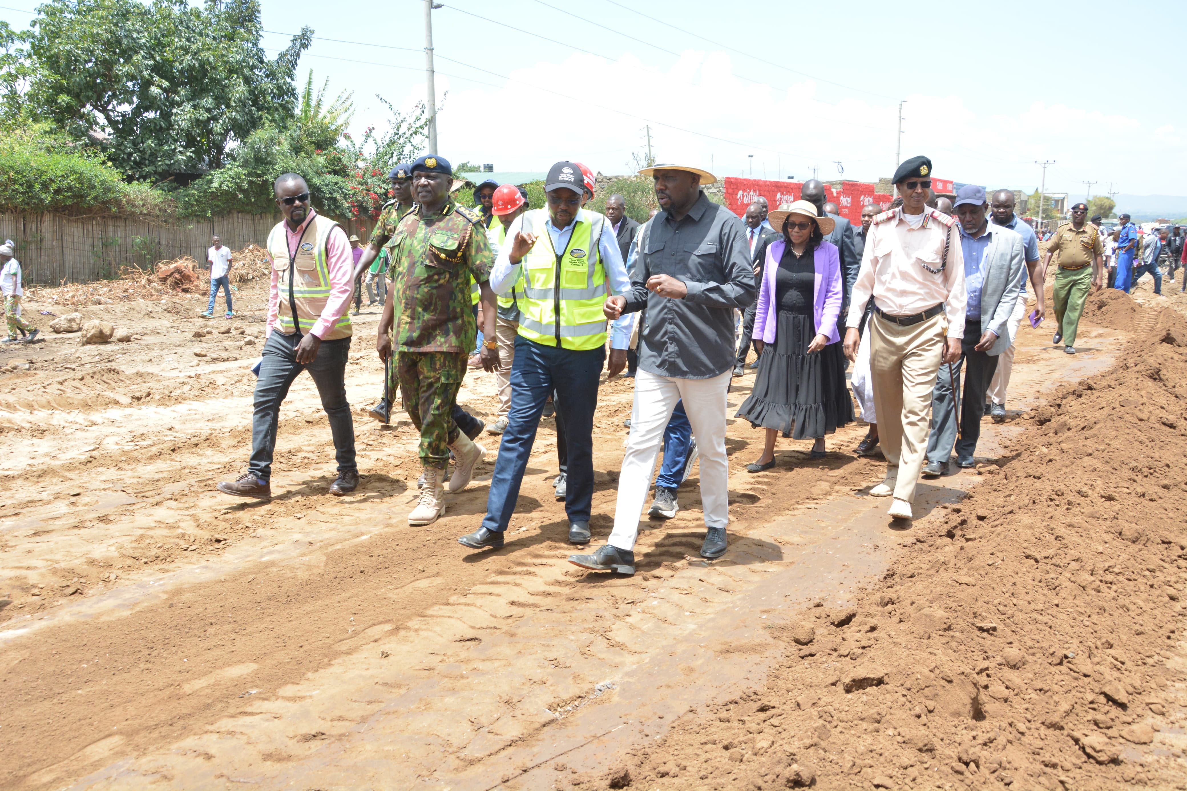 Cabinet Secretary, Ministry of Interior and Coordination of National Government Kipchumba Murkomen (front right) with administrative officials and Nakuru County Governor Susan Kihika during an inspection tour of the construction of Rironi -Mau Summit Road in Naivasha