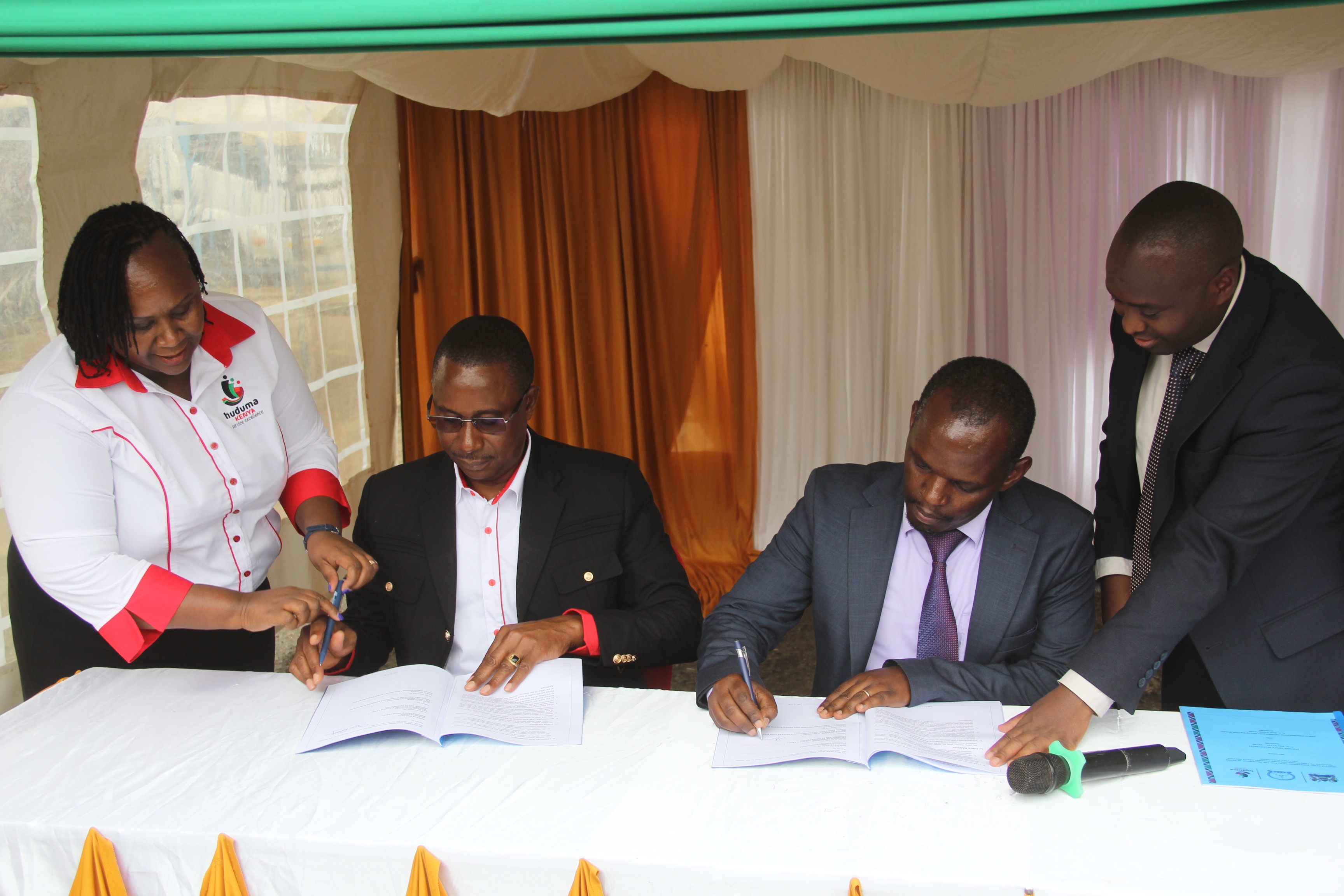 Huduma Kenya and the Kenya Engineering Technology Registration Board (KETRB) sign the service level agreement to officially launch services at the Eldoret Huduma Centre.