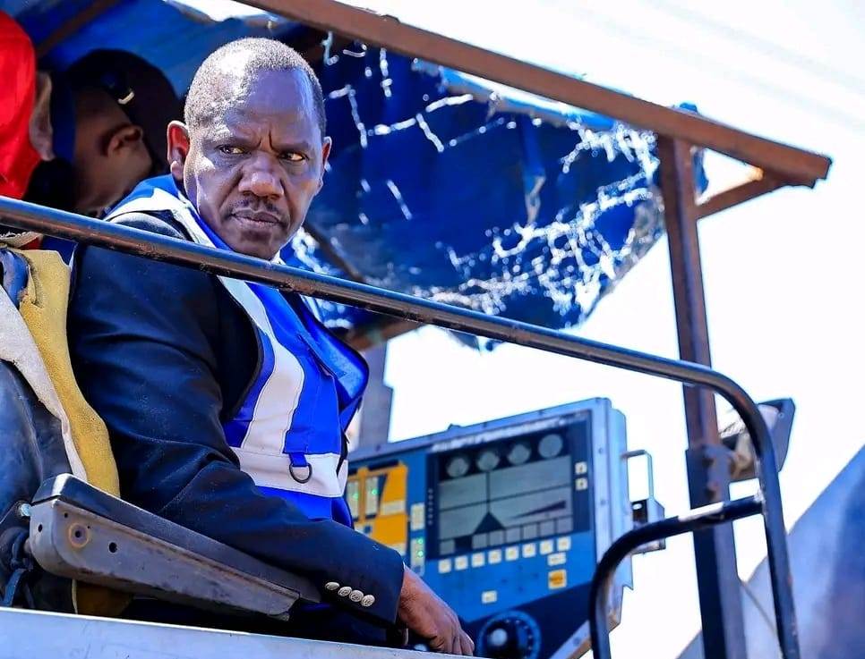 Uasin Gishu County Governor Dr. Jonathan Bii Chelilim atop a bitumen paver machine during the inspection of the ongoing 4-kilometer Maili Nne Road upgrade in Turbo Sub-County, Uasin Gishu County.