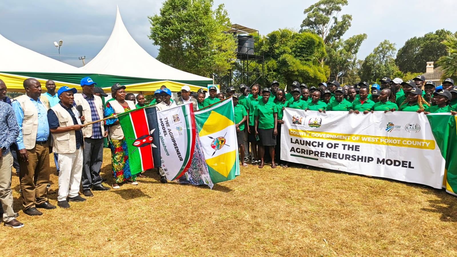 Agriculture PS Dr. Paul Rono, his Public Works counterpart Joel Arumonyang and West Pokot Deputy Governor Robert Komolle, during the unveiling of 140 agripreneurs at the local Governor’s residence in  Kapenguria sub county