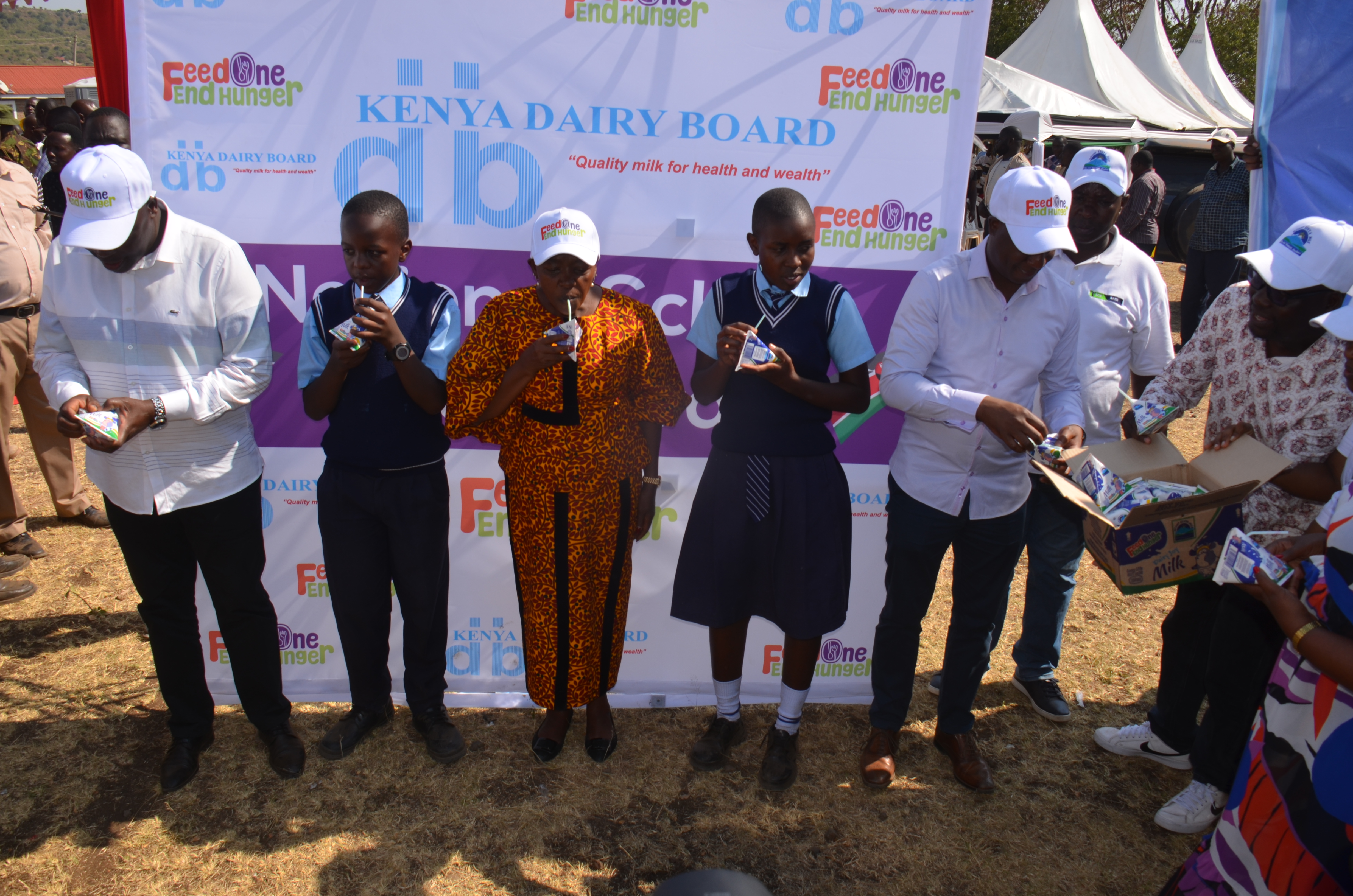 The First Lady Mama Rachel Ruto watering a kitchen garden at Bondo Kosiemo Primary school in Nyatike West Sub County. Photo/MAKOKHA KHAOYA