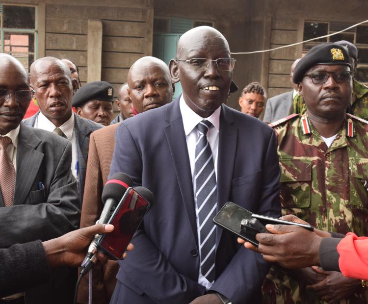 Dr. Belio kipsang, PS Basic Education addressing the media during inspection of construction of grade 9 classrooms in Nyandarua County (photo by Kimani Tirus)