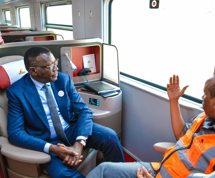 Roads and Transport Cabinet Secretary Davis Chirchir oboarding the Madaraka Express Passenger Service Train 