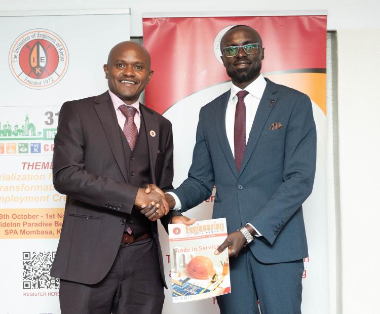 The President of the Institute of Engineers of Kenya Eng. Shammah Kiteme (left) and the Cabinet Secretary Ministry of Water Sanitation and Irrigation Eng. Eric Mugaa during the launch of the 31st Annual International Convention. Photo/Manu Mumba