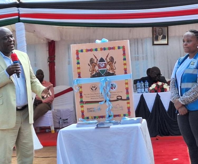 Head of Alternative Family Care Lloyd Isadia leads in launching a foster care reform report at Catholic Diocese of Murang’a grounds.