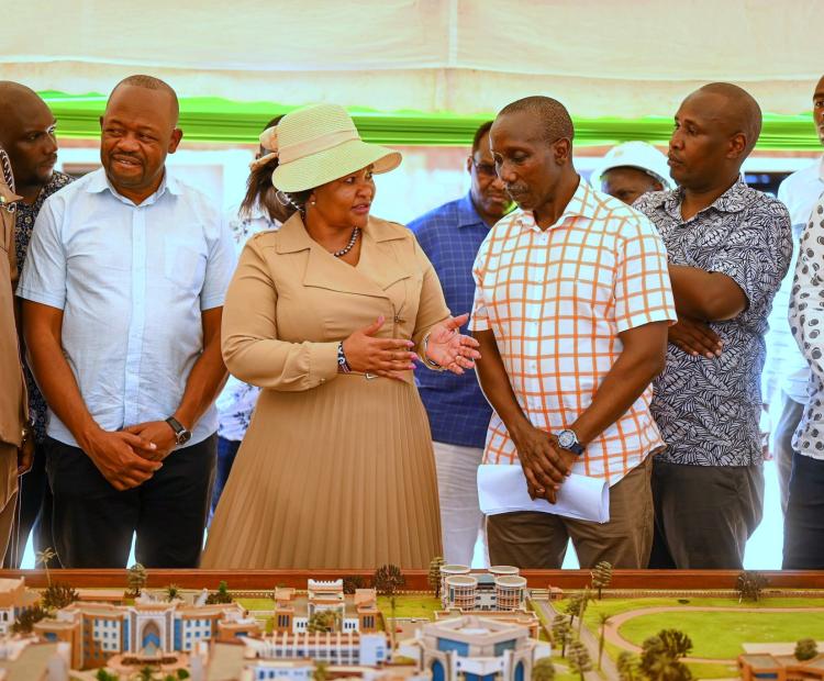 Cabinet Secretary (CS) for Tourism Rebecca Miano is taken through architecture designs during an inspection tour of the Ronald Ngala Utalii College, Vipingo. Photo/Andrew Hinga