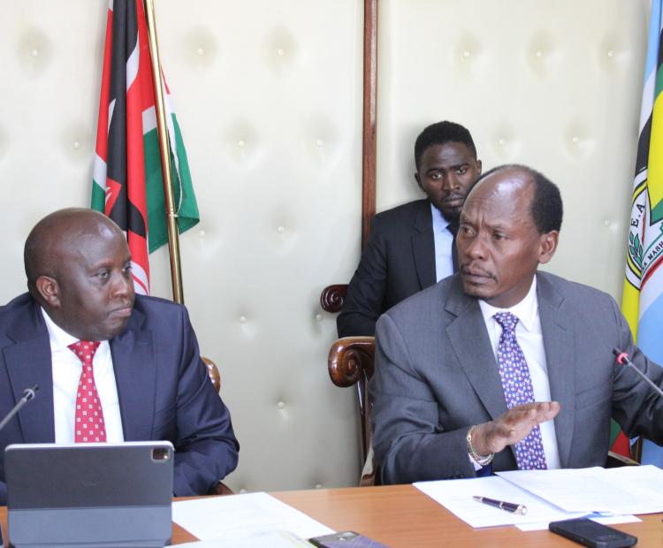 Information, Communications and The Digital Economy Cabinet Secretary (CS) William Kabogo (right) speaking on Wednesday during a meeting with heads of departments and divisions from the State Department of ICT. He is flanked by the State Department for ICT and Digital Economy Principal Secretary (PS) Eng. John Tanui (left). Photo by Erick Bosire.