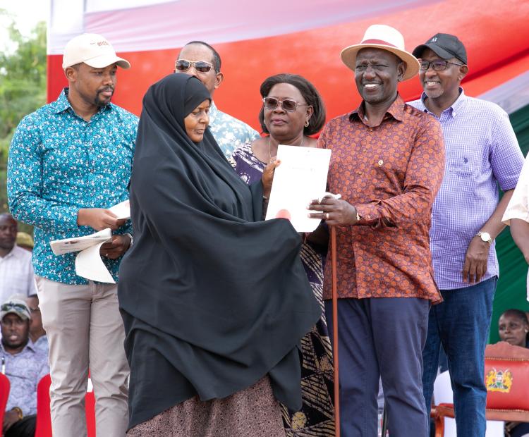 President William Ruto and senior government offocials during issuance of 3,000 title deeds to residents of five adju dication sections in Garissa Township Sub- County. Photo/Erick Kyalo