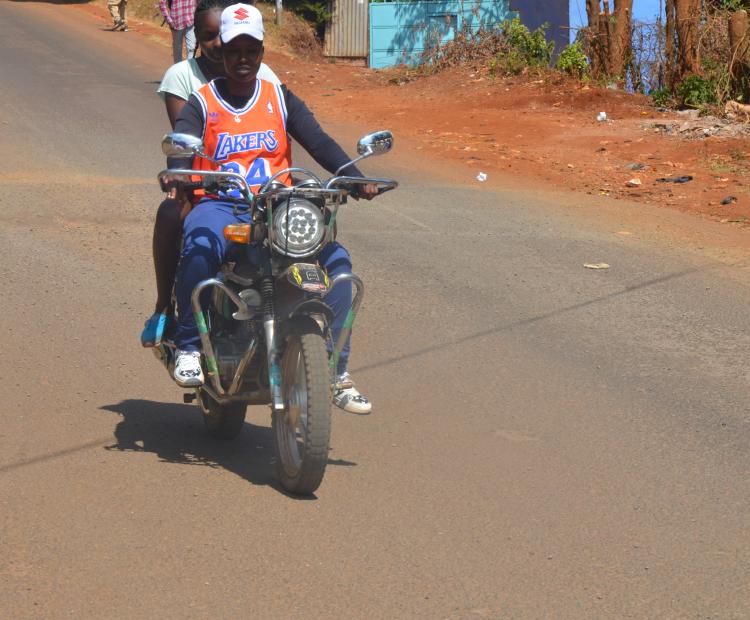 Jackline Wawira ferrying a passenger along Ring Road in downtown Nyeri. The Senate  has drafted a new Bill which aims to regulate the motorcycle transport sector in the  country. PHOTO/KNA
