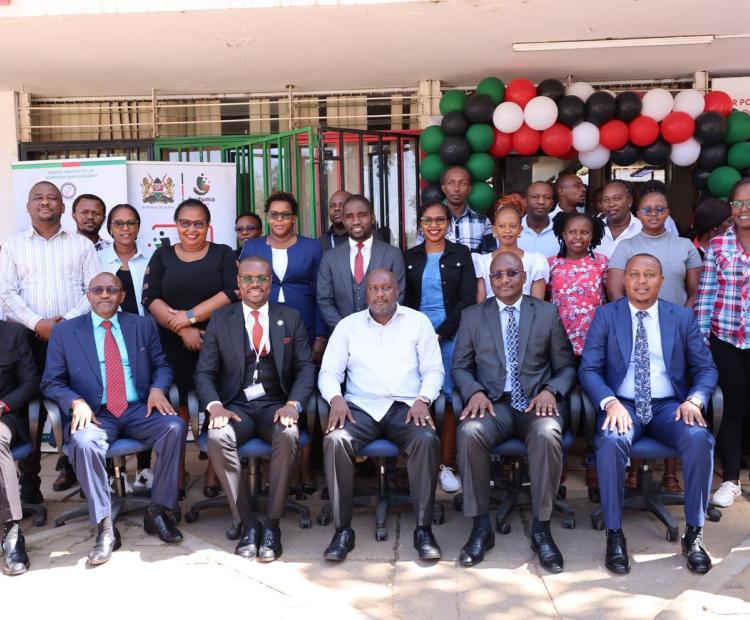 Principal Secretary Public Service Amos Gathecha (M) at the Machakos Huduma Centre during the Launch of Kenya Institute of Supplies Management services (KISM) into Huduma Centre. Phot/Anne Kangero