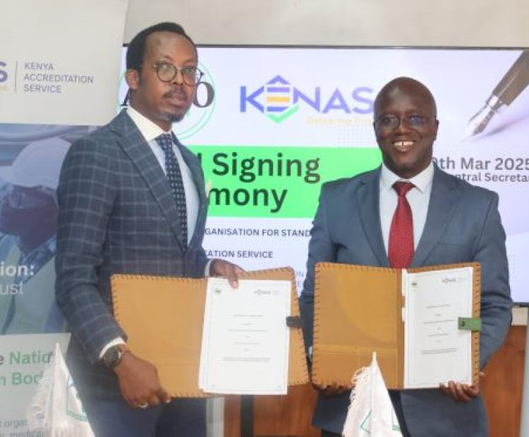 Dr. Hermogene Nsengimana, ARSO Secretary General and Dr. Walter Ongeti,  KENAS CEO with the signed MOUs at ARSO offices, International House, Nairobi.