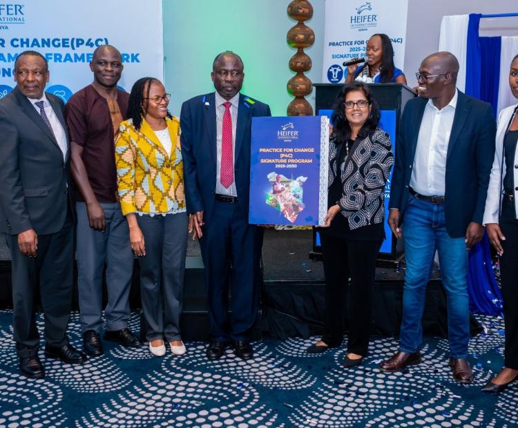  Clarice Bugo-Kionge, Country Director, Heifer international Kenya on the left, Dr. Christopher Wanga, Director of Livestock Policy Research at the Ministry of Agriculture, and Surita Sandosham president and CEO heifer international during the launch of heifers Kenya signature program framework