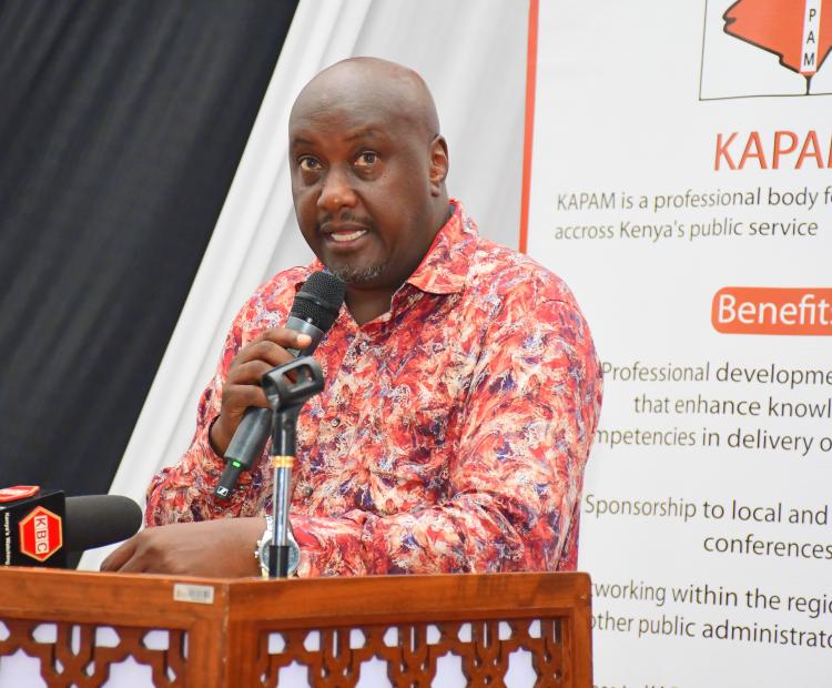 Deputy Head of Public Service Amos Gathecha gives the keynote address during the symposium on smart governance at the Kenya School of Government, Mombasa.