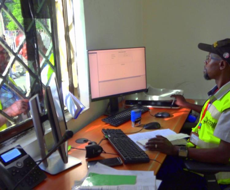 A Kenya Revenue Authority (KRA) Customs Officer clears cargo at a border point