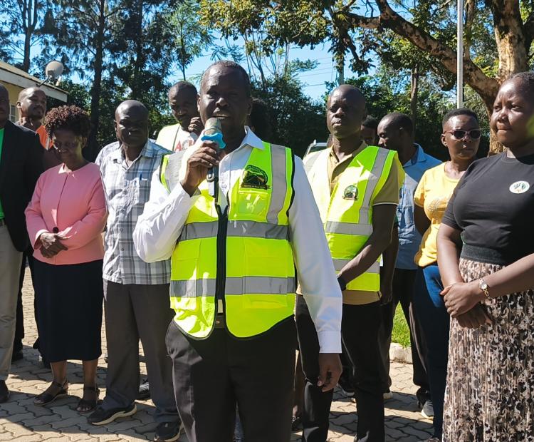 Western Kenya Rural Roads Authority (KeRRA) Manager Eng. Edwin Cheserek speaking before flagging off a caravan at KeRRA offices in Kakamega town