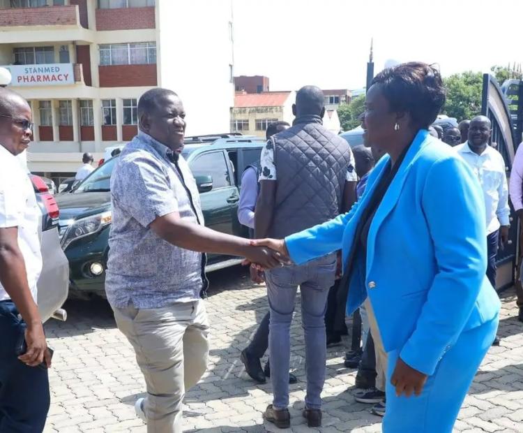 Sports Cabinet Secretary Salim Mvurya (middle) is welcomed by Homa Bay Governor Gladys Wanga when he arrieved for the handing over ceremony of the Raila Odinga Stadium in Homa Bay.