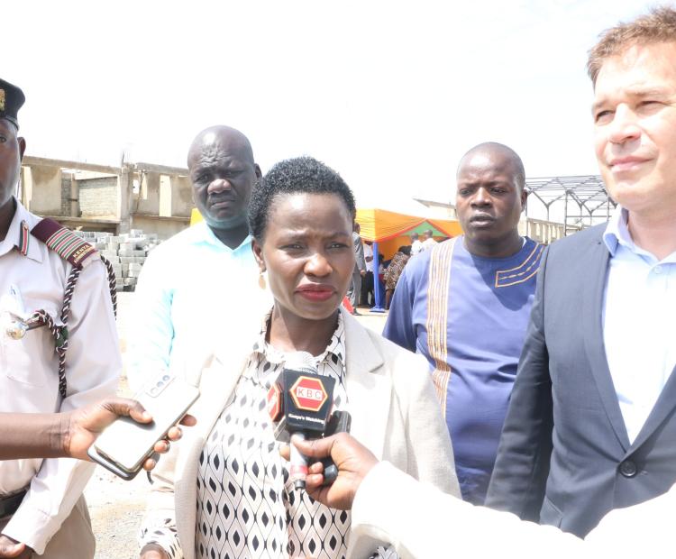 The Principal Secretary of Micro Small and Medium Enterprise (MSME’s) Susan Mang’eni (c) The country program director of GIZ Dr. Christoph Zipfel (r) and Busia County commissioner Chaunga Mwachaunga.