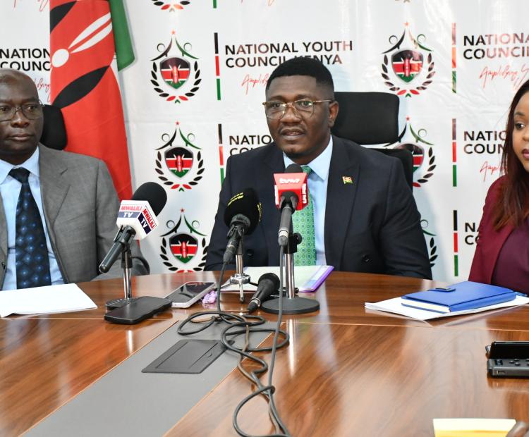 Principal Secretary, State Department for Youth Affairs and Creative Economy, Fikirini Jacobs (centre), Chief Executive Officer, National Youth Council, Ms Gloria Wawira (right) and National Steering Committee for the National Youth Council Elections, George Marcel Osaso, during the press briefing on upcoming National Youth Elections at Talanta Plaza, Nairobi.