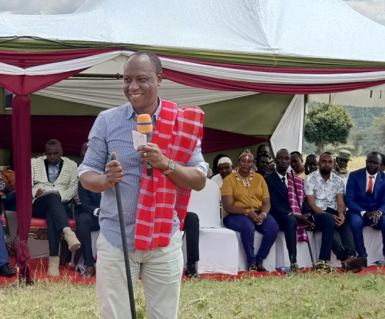 Livestock Development Principal Secretary Jonathan Mueke addressing residents of Nomotio, Samburu County after the launching a Sh13.2 million water pan. PHOTO BY ROBERT GITHU