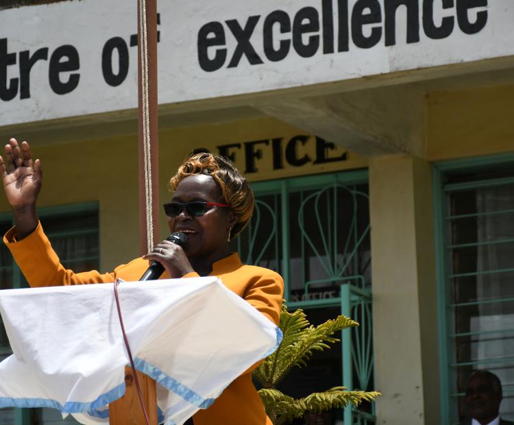 Central Region Director of Education Sabina Aroni addressing students at the Tetu Girls Boarding Primary School when she visited the institution